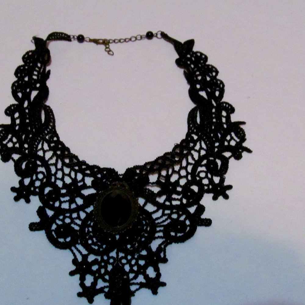 Woman's goth look choker lace with black cabochons